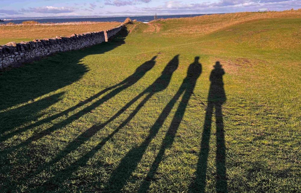 Shadows of the four DARE team members