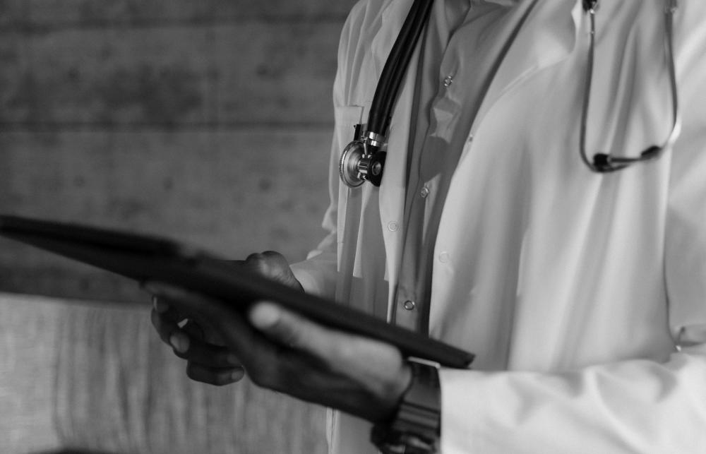 Doctor holding tablet computer